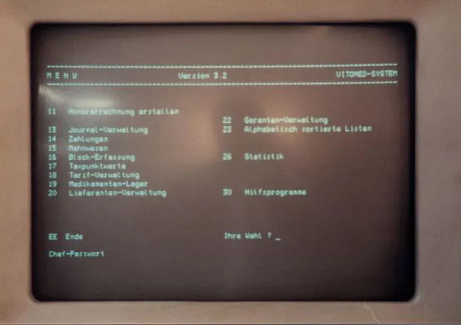 Bildschirmfoto des vitomed-Menüs der Version 3.2 mit den Punkten Honorarrechnung, Journal-Verwaltung und Taxpunktwerte